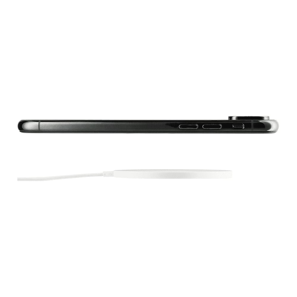 A sleek black ultra-thin wireless charging pad alongside a smartphone, featuring a white charging cable.