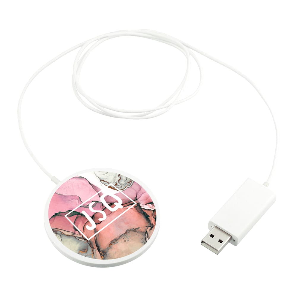 A round, ultra-thin wireless charging pad with a pink and white marbled design and a white USB cable.