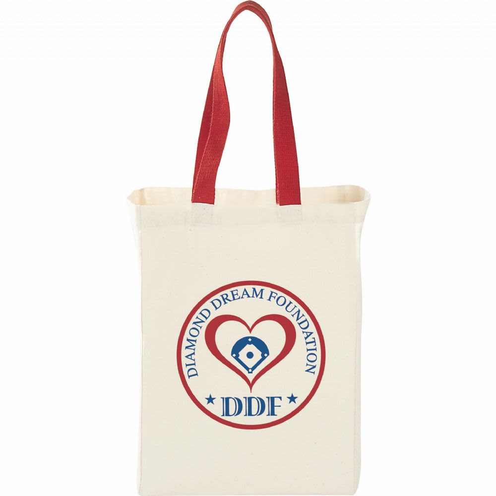 A natural cotton grocery tote bag in cream with red handles and a logo featuring a heart and text.