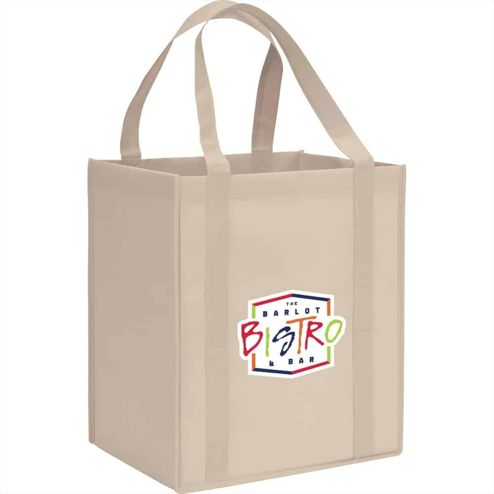 A beige reusable grocery tote with sturdy handles and a logo on one side. The bag has a square shape and is made of non-woven material.