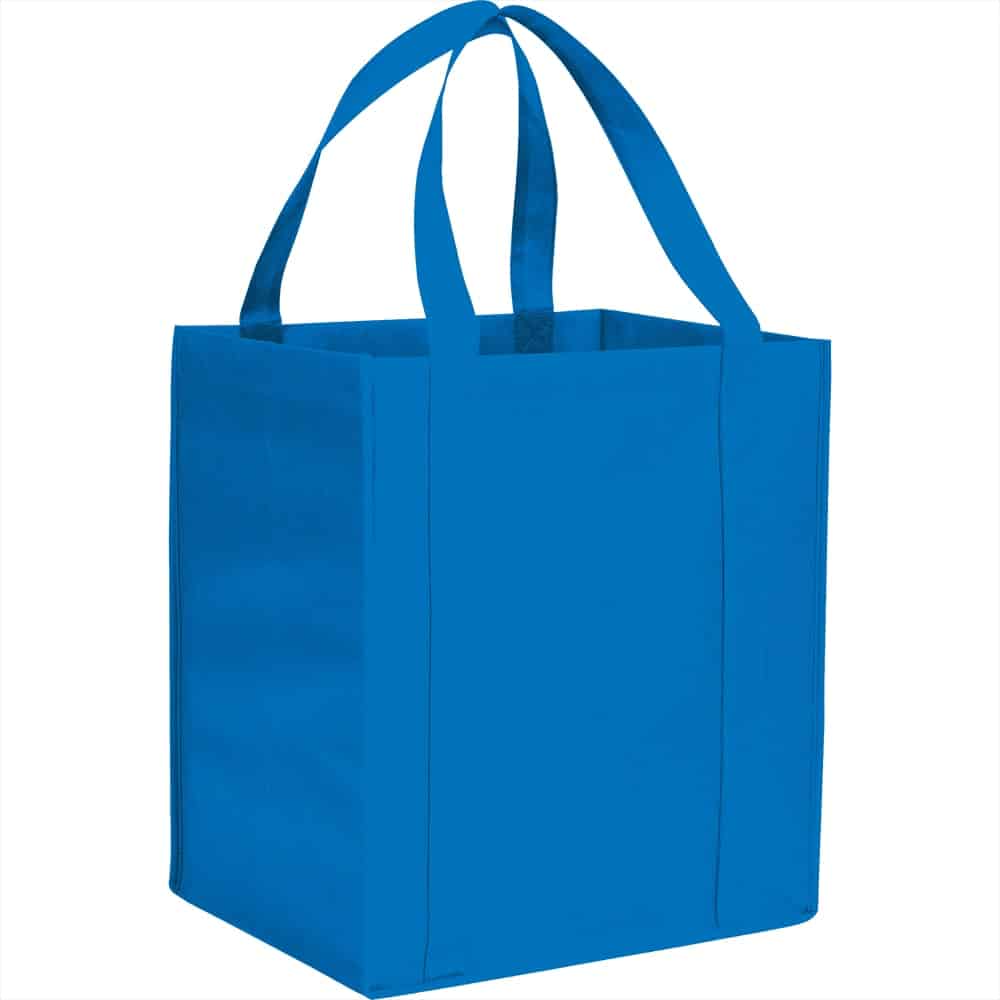 A blue non-woven grocery tote bag with two handles and a square shape. It features a logo.