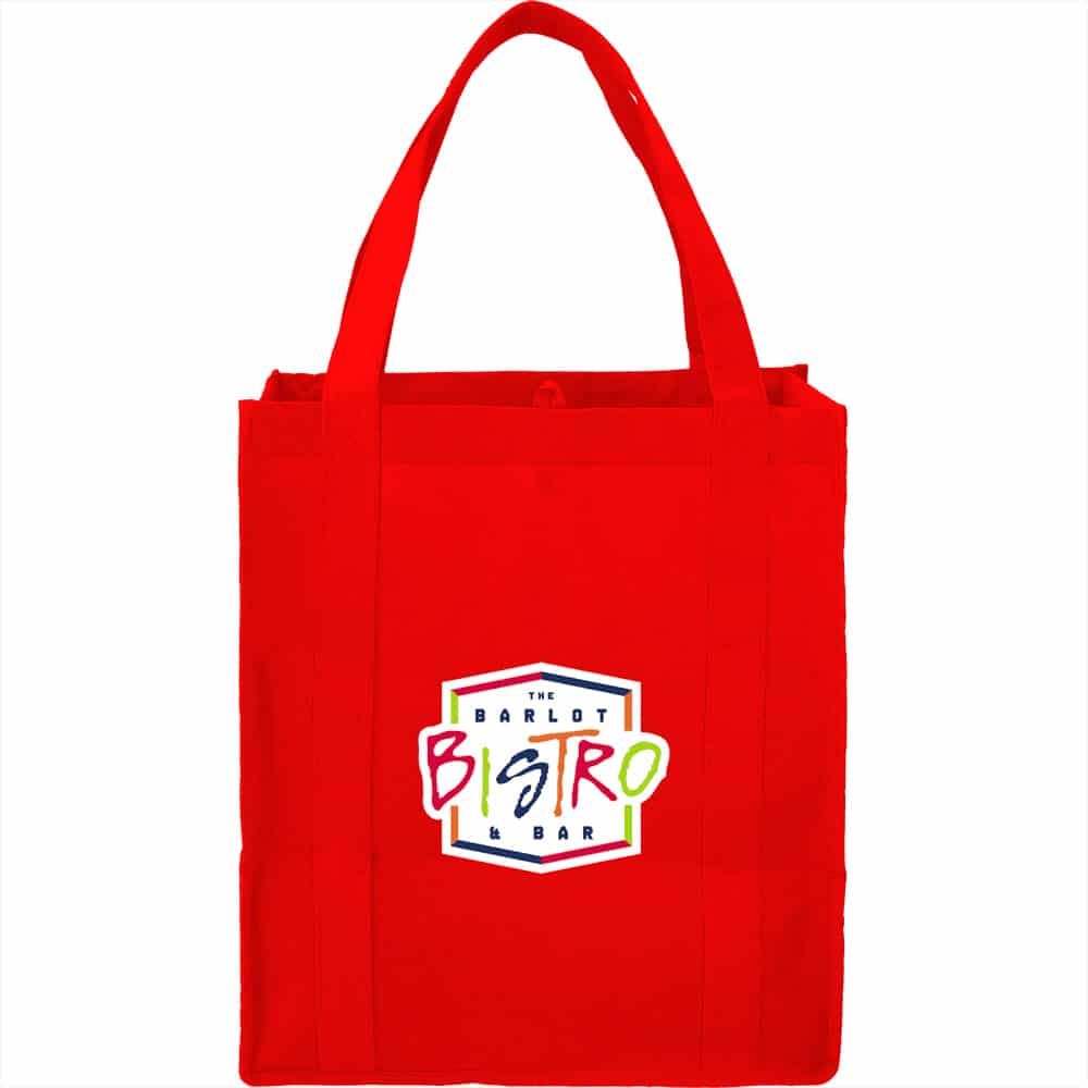 A red non-woven grocery tote bag featuring a logo on the front, with sturdy handles.
