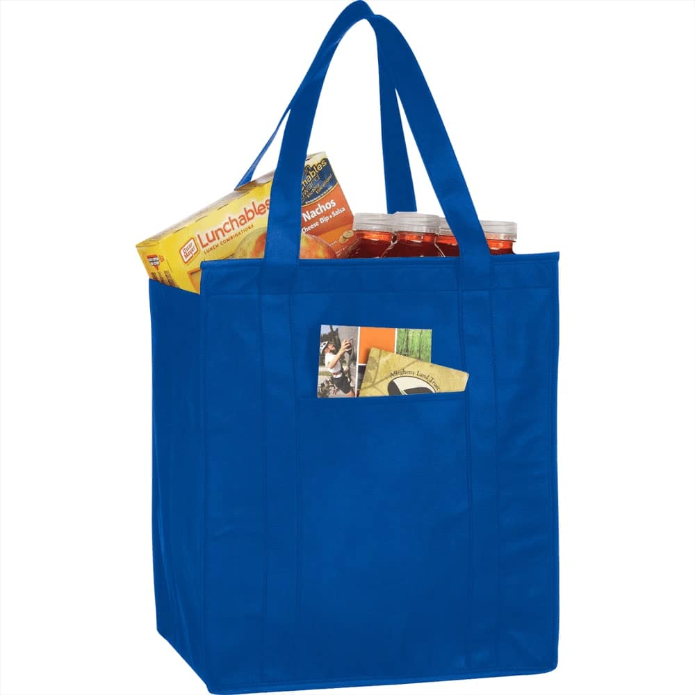 A blue insulated grocery tote filled with Lunchables and several drink bottles, featuring an exterior pocket.