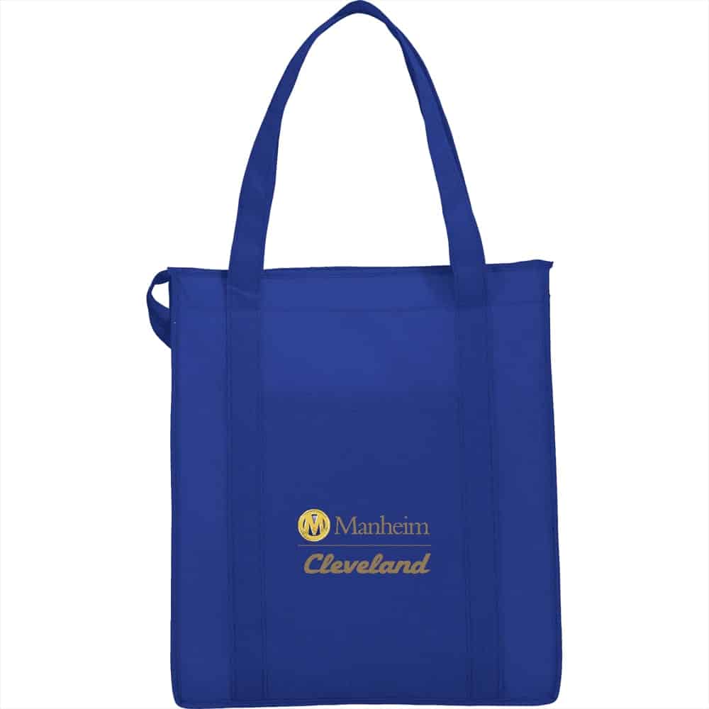 A blue insulated grocery tote with shoulder straps and a logo on the front.