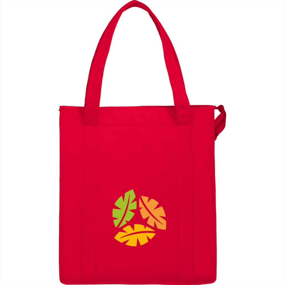 A red insulated grocery tote bag with handles, featuring a colourful leaf pattern and a logo.
