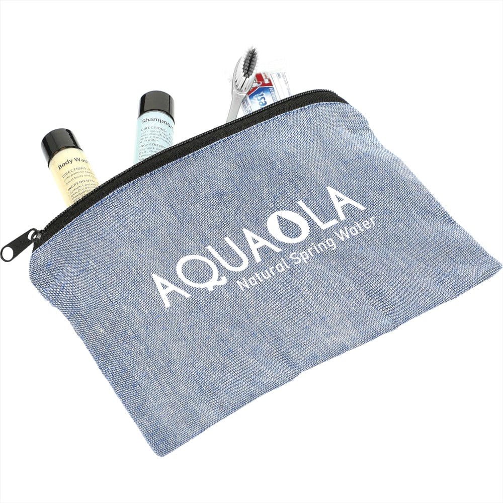 A blue recycled cotton twill pouch with a zipper, containing travel-sized shampoo and toothpaste. It has a logo.