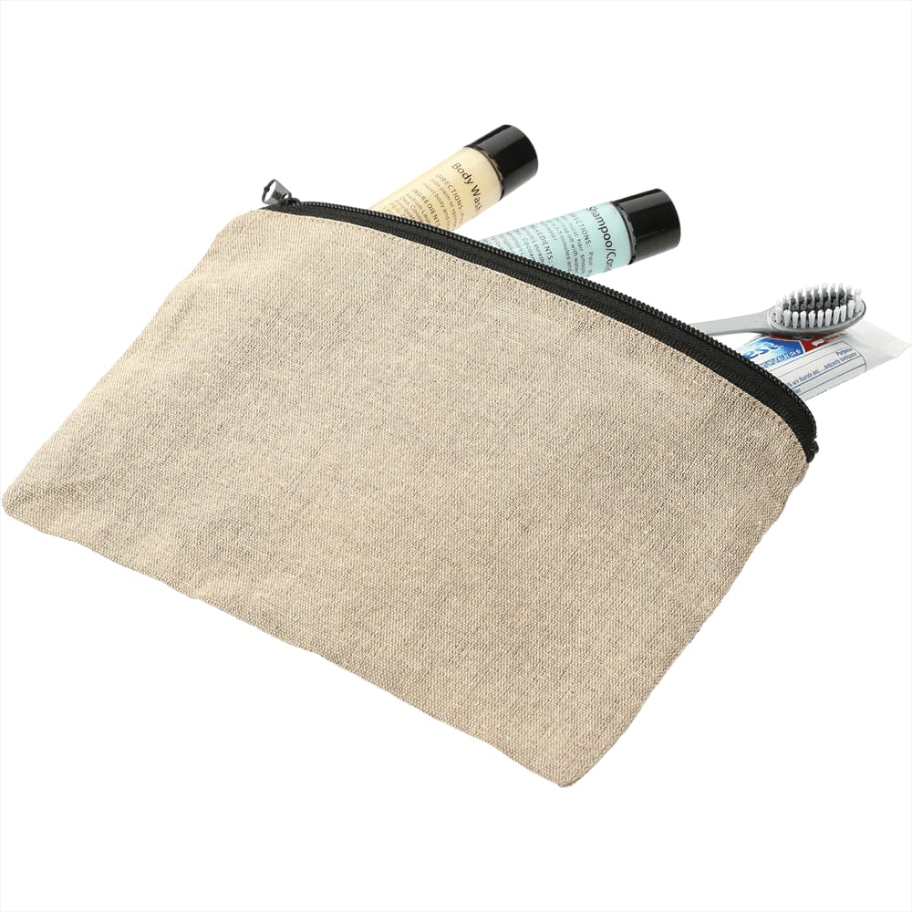 A recycled cotton twill pouch in a natural beige colour, containing toiletries and a toothbrush. Features a zip closure and branding.