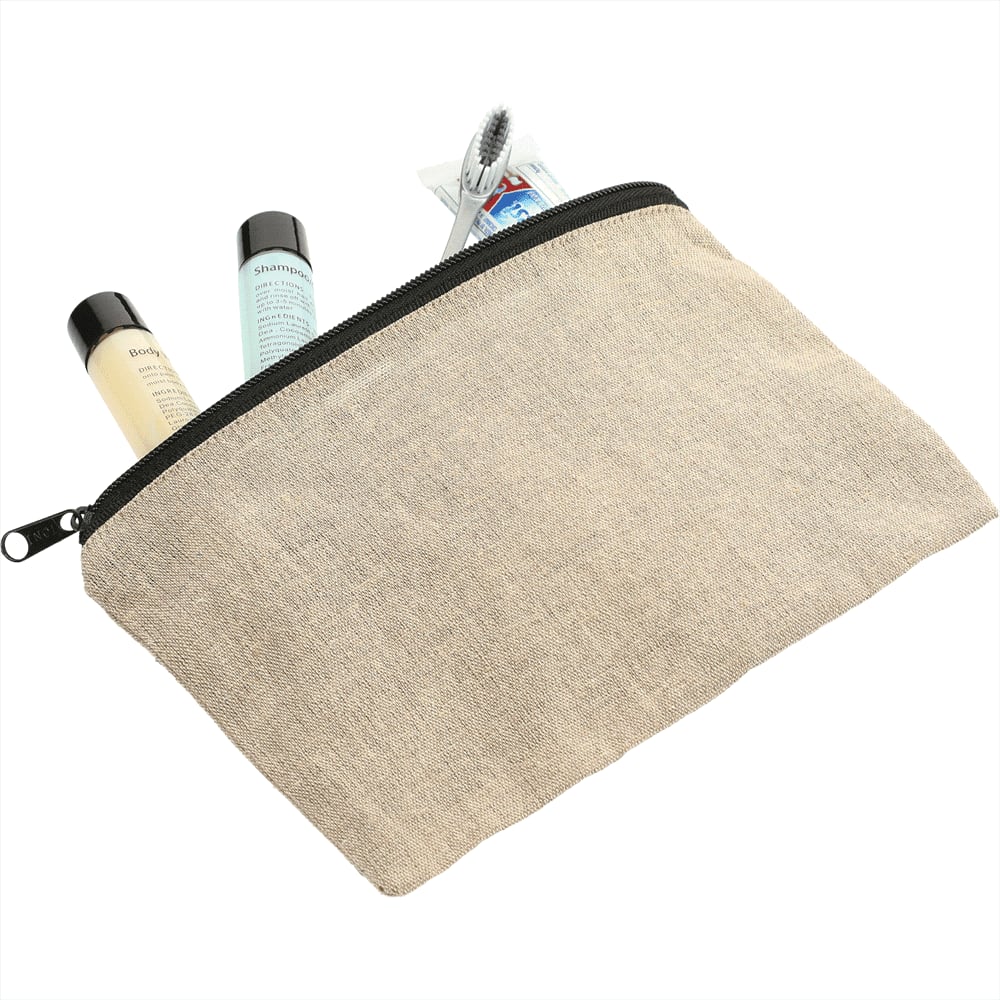 A beige recycled cotton twill pouch with a zipper, containing small toiletries and a toothbrush.
