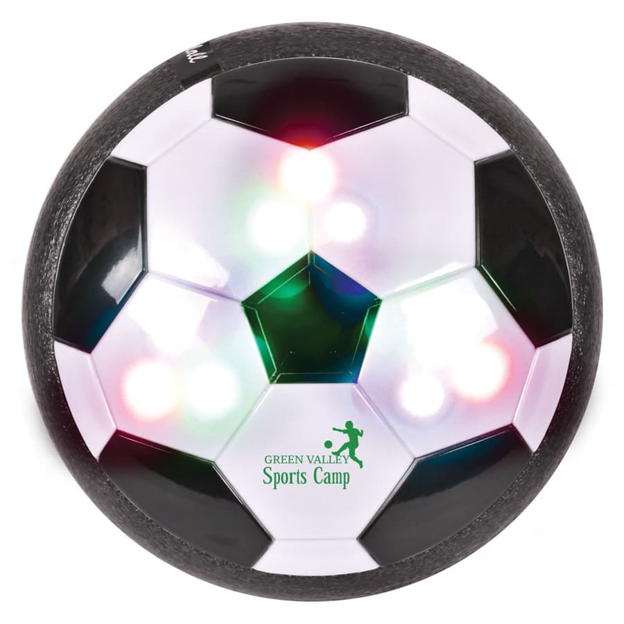 A round, soccer-themed hover ball featuring black and white panels and colourful LED lights. It has a logo on the surface.