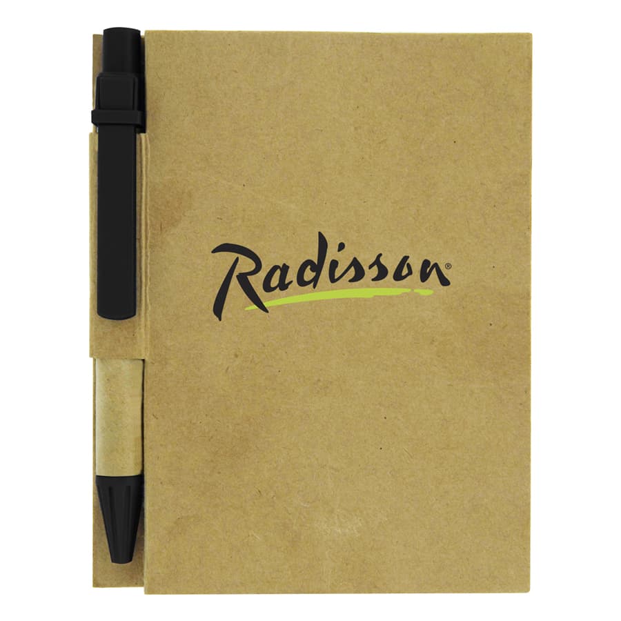 A brown recycled notebook with a black pen attached, featuring a logo on the front cover.
