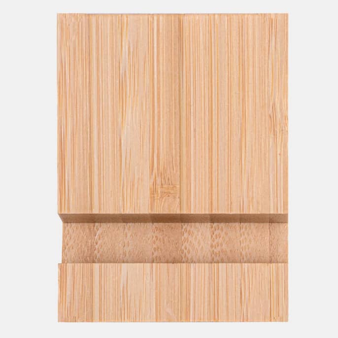 A bamboo phone holder in a natural light beige colour, featuring a minimalist design with smooth edges.