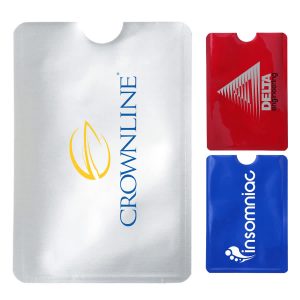 A set of three RFID credit card protector sleeves in silver, red, and blue, featuring various logos.