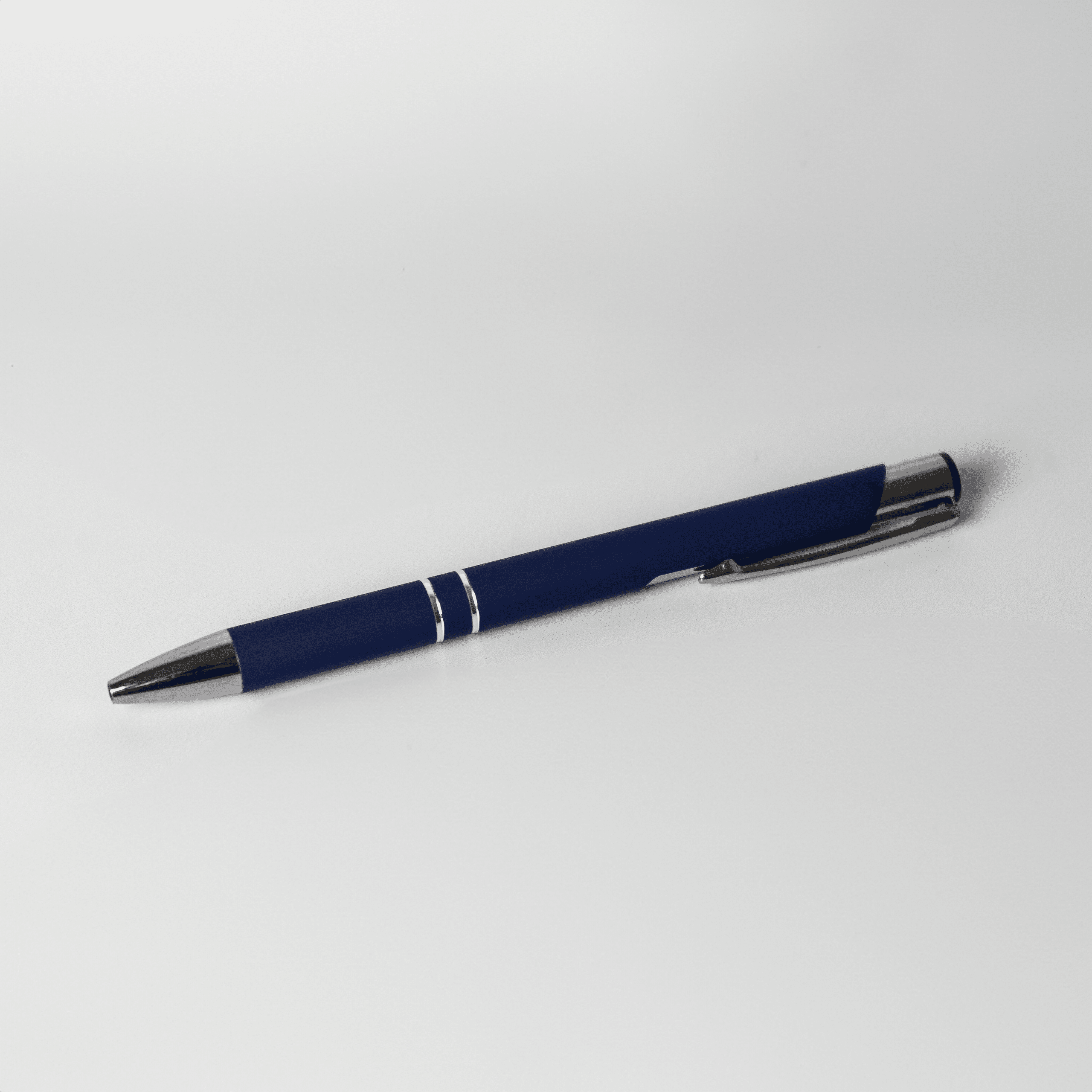 Navy blue promotional pen with silver accents and clip on a white background, suitable for custom branded pens and corporate promotional merchandise.