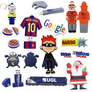 A collection of colourful custom USB flash drives in various shapes, including figures, logos, and themed designs.