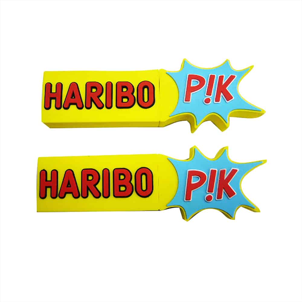A vibrant yellow USB flash drive with a blue and red design, featuring the word 