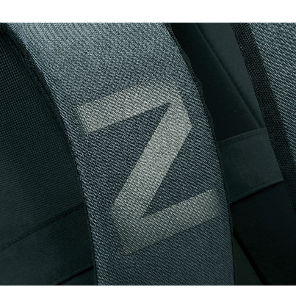 A black and grey laptop backpack featuring padded shoulder straps and a logo.