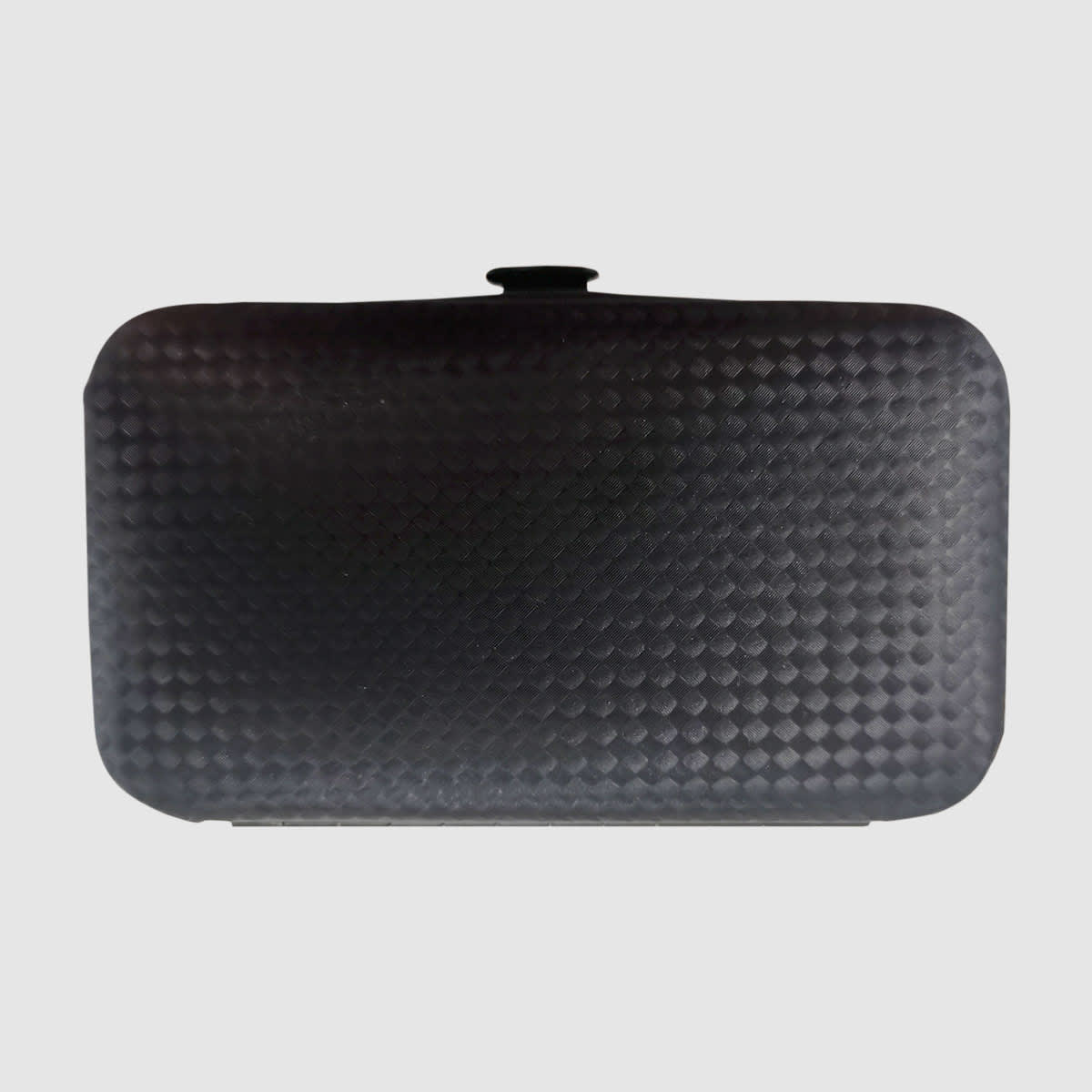 A black manicure set case with a textured surface, featuring a secure closure and compact design.
