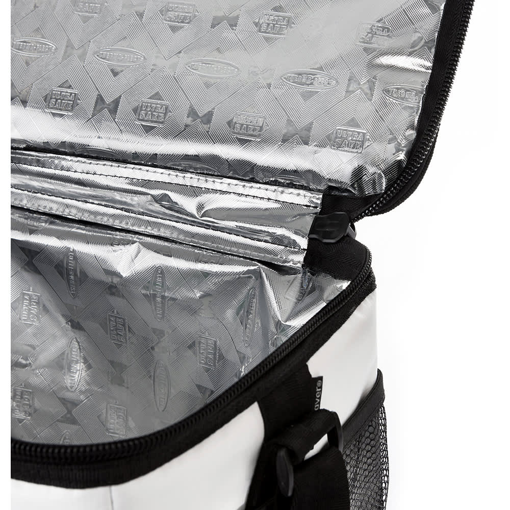 A cooler bag in white with a silver insulated interior, featuring a zippered closure and mesh side pocket.