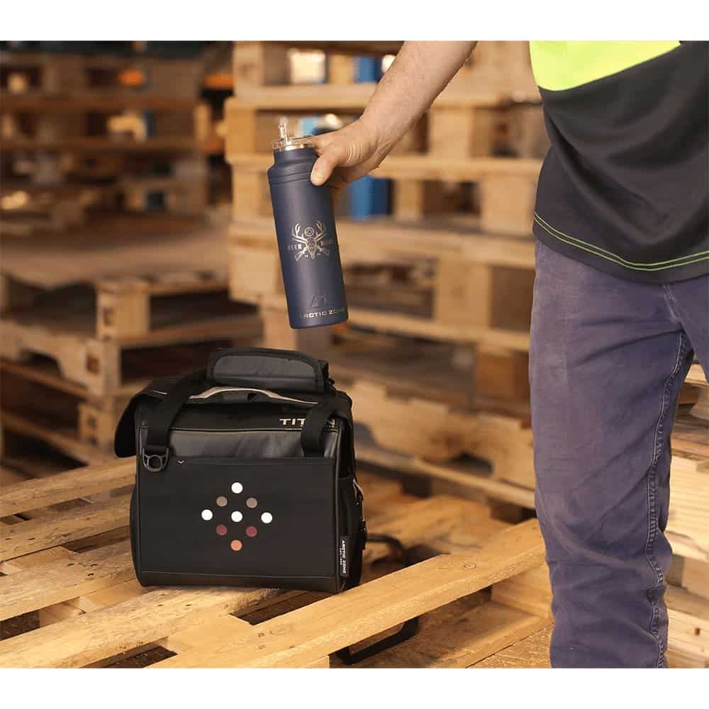 A black lunch cooler with adjustable straps and a handle, featuring a logo and various storage compartments.