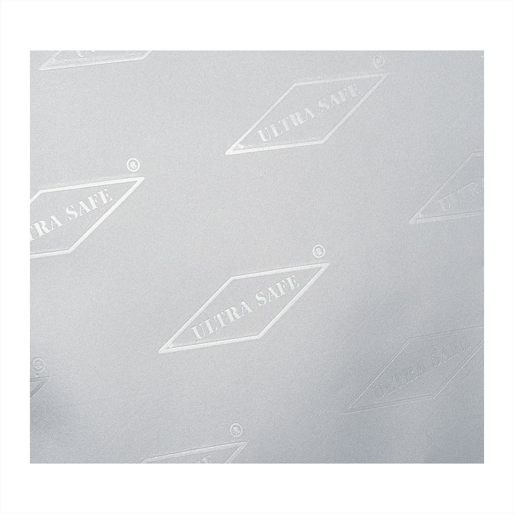 A textured grey surface featuring a repeating pattern with the words 