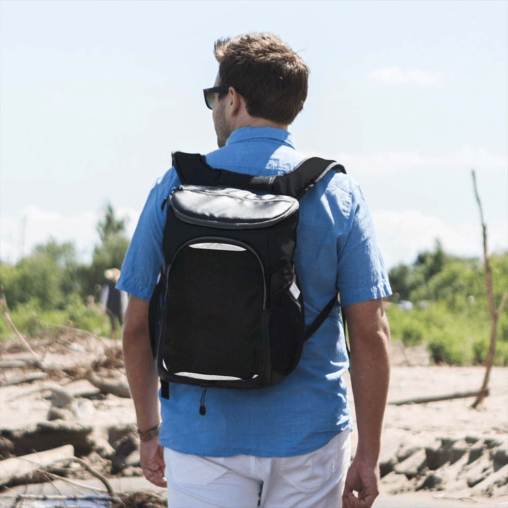 A black backpack cooler with a large insulated compartment and a front pocket, featuring a logo.