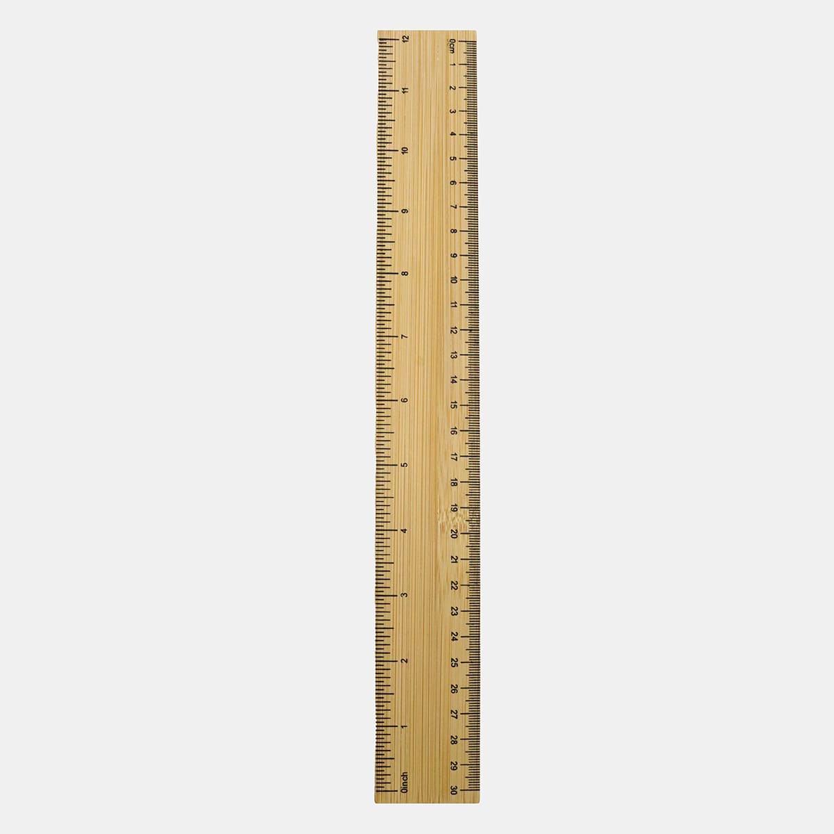 A bamboo ruler in a natural finish, featuring metric and imperial measurements, with a branding logo.