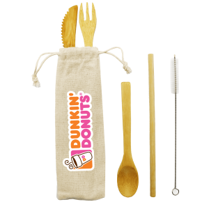 A bamboo cutlery set including a knife, fork, spoon, cleaning brush, and a natural drawstring pouch.
