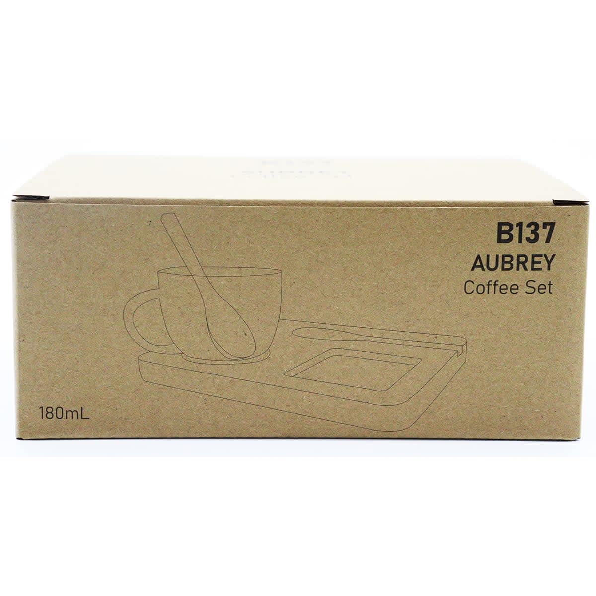 A coffee and tea set in a cardboard box, featuring a cup, a spoon, and a tray. The box is a light brown colour.