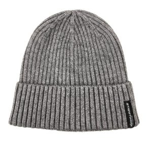 A grey beanie with a ribbed texture and a branding label on the side. Suitable for unisex wear.