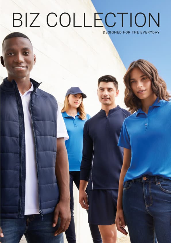 A group of four people wearing various blue uniforms and outerwear, with one person in a navy vest and another in a cap.