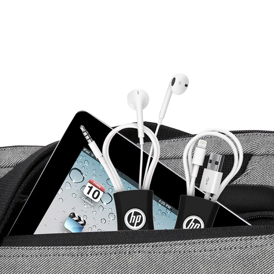 A cable manager featuring a sleek black design, containing white earphones and charging cables in a bag pocket.