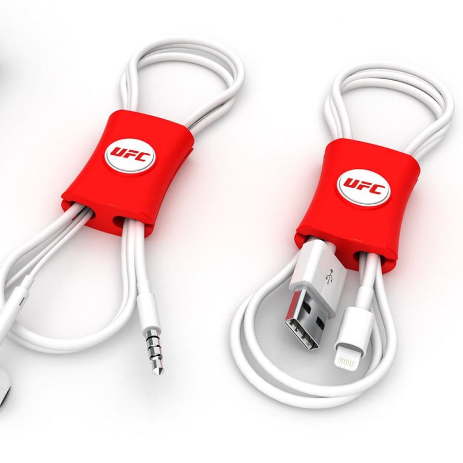 A red cable manager with a logo, designed to organise and tidy phone cables.