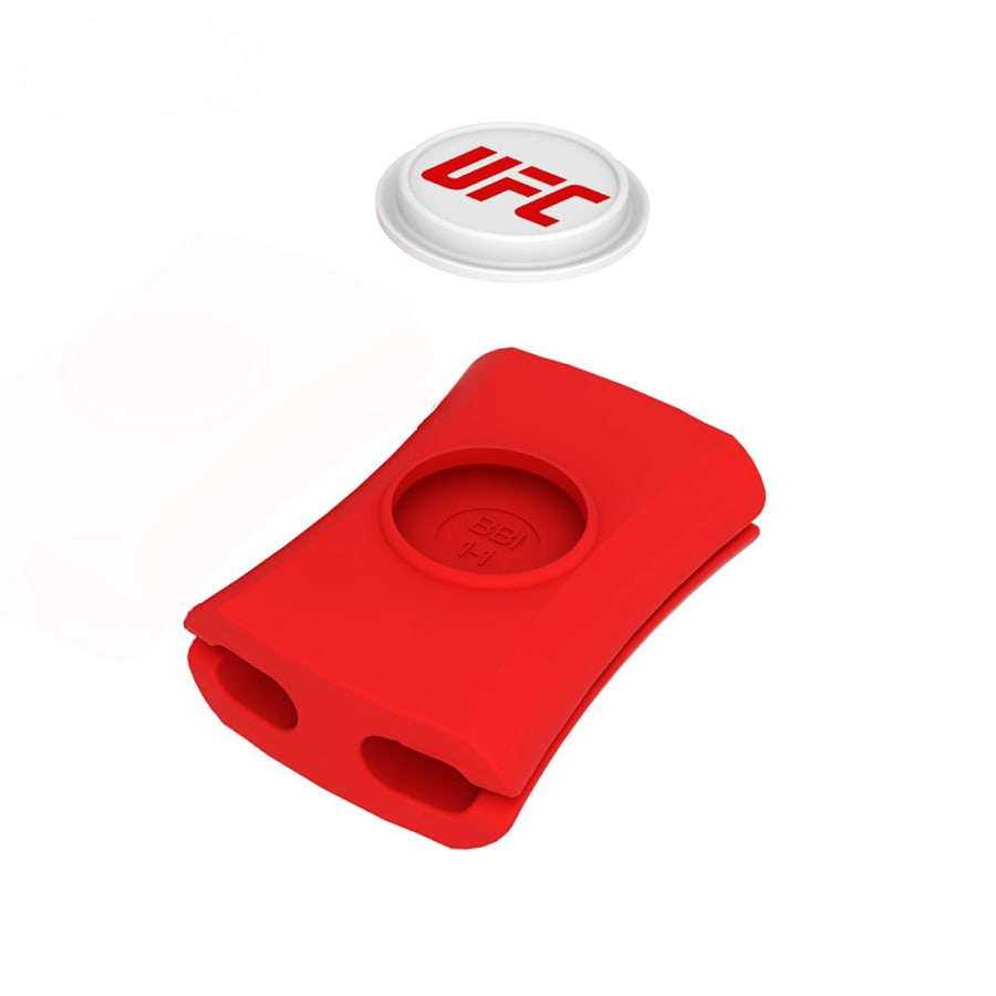 A red cable manager with two openings, designed to tidy cables, featuring a logo on top.