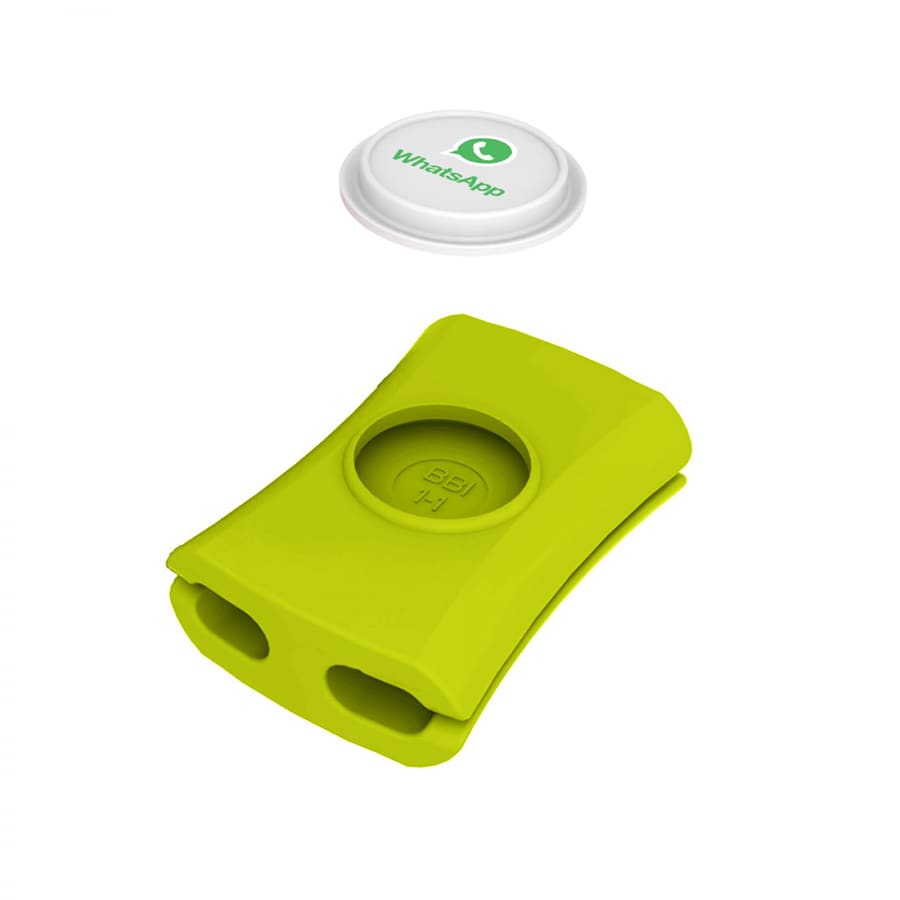 A green cable manager featuring two openings, accompanied by a white circular object with a logo.