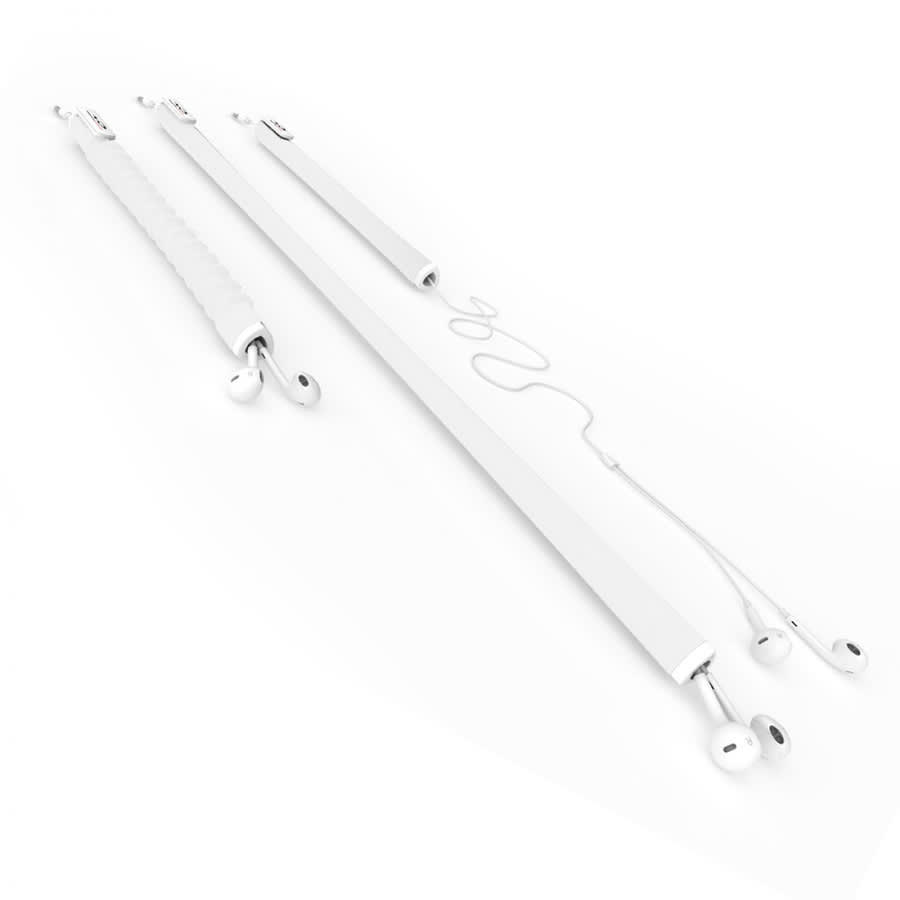 A white earbud organiser with multiple sections for tidy storage of headphone cables, featuring a smooth design.