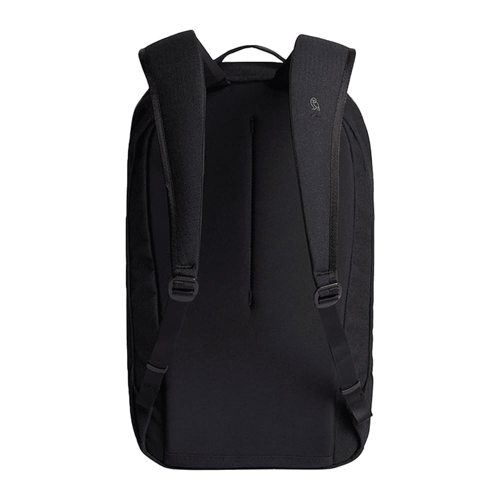 A navy blue backpack with a textured surface and adjustable shoulder straps, featuring a logo on the side.