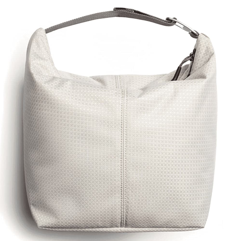 A black cooler bag with a cream interior, featuring a zippered opening and a logo tag.
