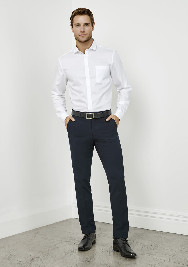 A pair of slim fit men's pants in navy, styled with a white shirt and a belt. There is branding visible.