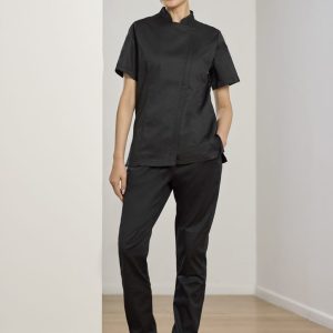 A black women's chef uniform featuring a short-sleeve top and jogger pants, paired with black clogs.