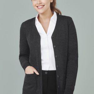 A dark grey women's button-front knit cardigan with a pocket, worn over a white shirt.