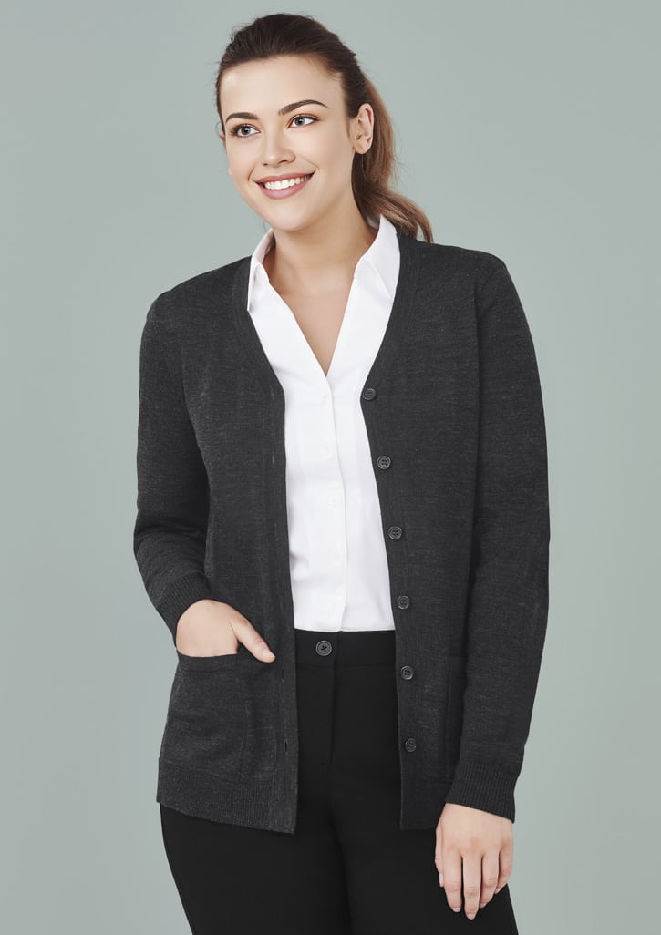 A dark grey women's button-front knit cardigan with a pocket, worn over a white shirt.