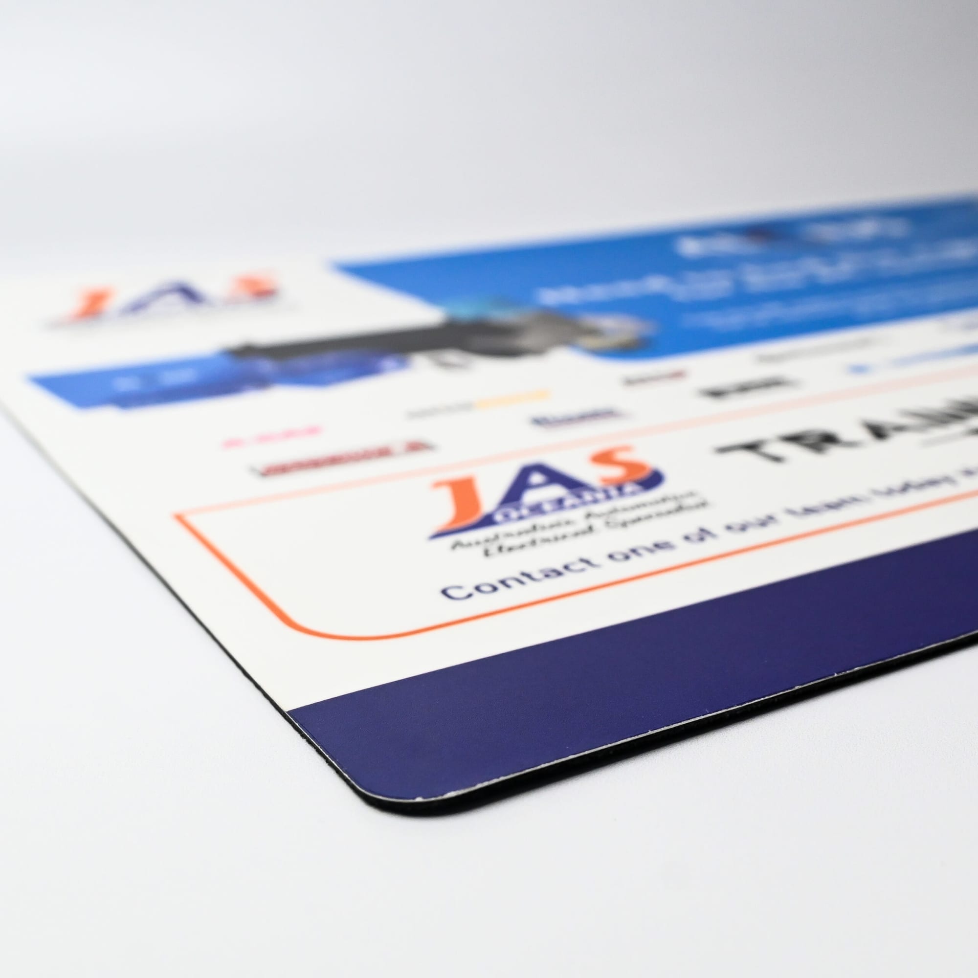 A counter mat in various colours with rounded edges and a logo, ideal for office and business use.