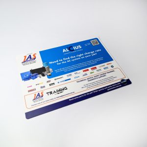 A counter mat featuring a variety of branding elements, predominantly in blue and white, with a glossy finish.