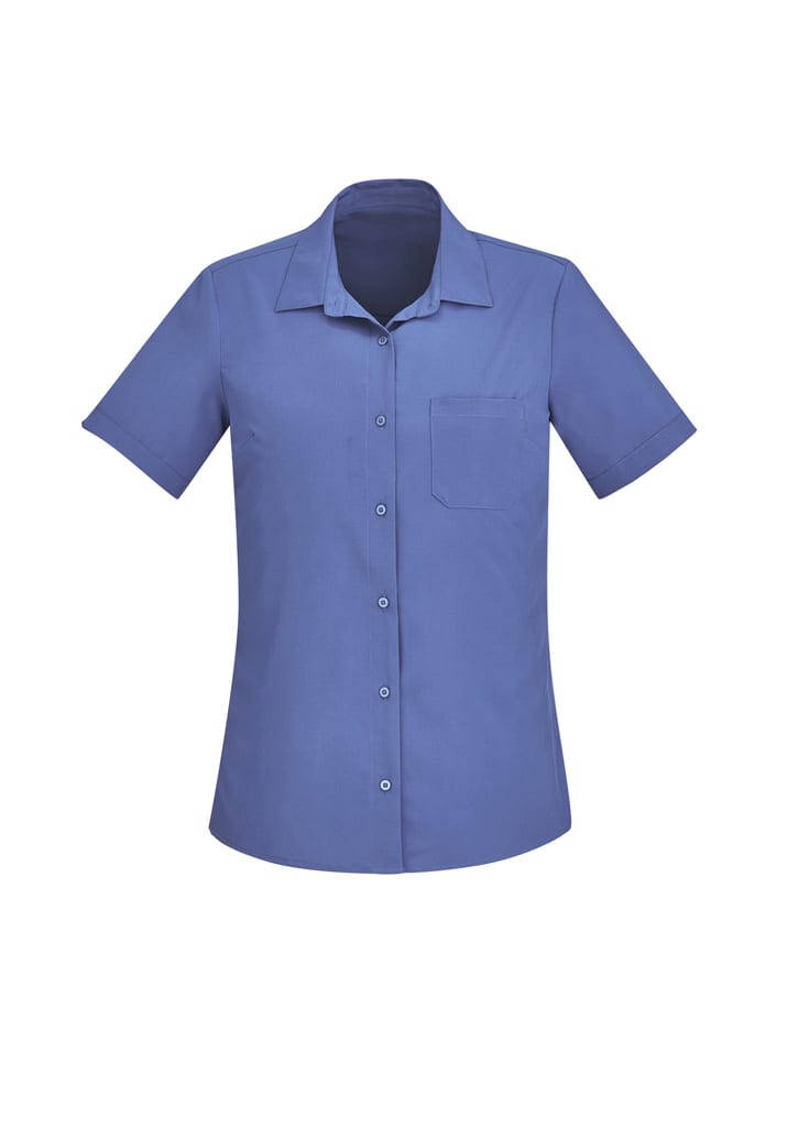 A women's short sleeve shirt in a solid blue colour featuring a button front and a chest pocket.
