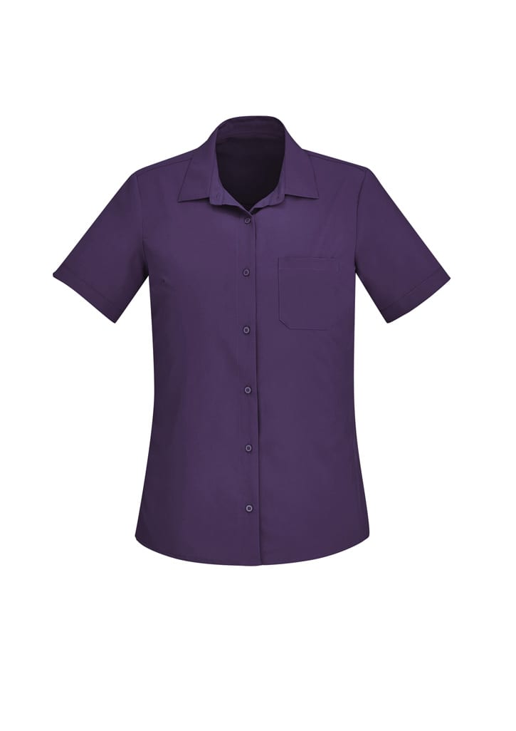 A short sleeve women's shirt in a rich purple hue with a single chest pocket and a button-up front.