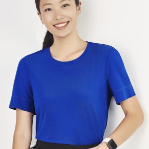 A women's short sleeve jersey top in bright blue, featuring a classic round neckline and a logo on the sleeve.