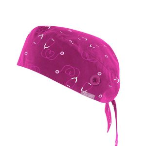 A unisex pink scrub cap featuring a printed design and buttons for adjustment. Suitable for various uniform settings.