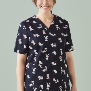 A navy scrub top featuring various printed cartoon animals. The top has a V-neck design and a logo on the sleeve.