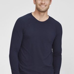 A men's performance long sleeve tee in navy blue, featuring a fitted design and a logo.