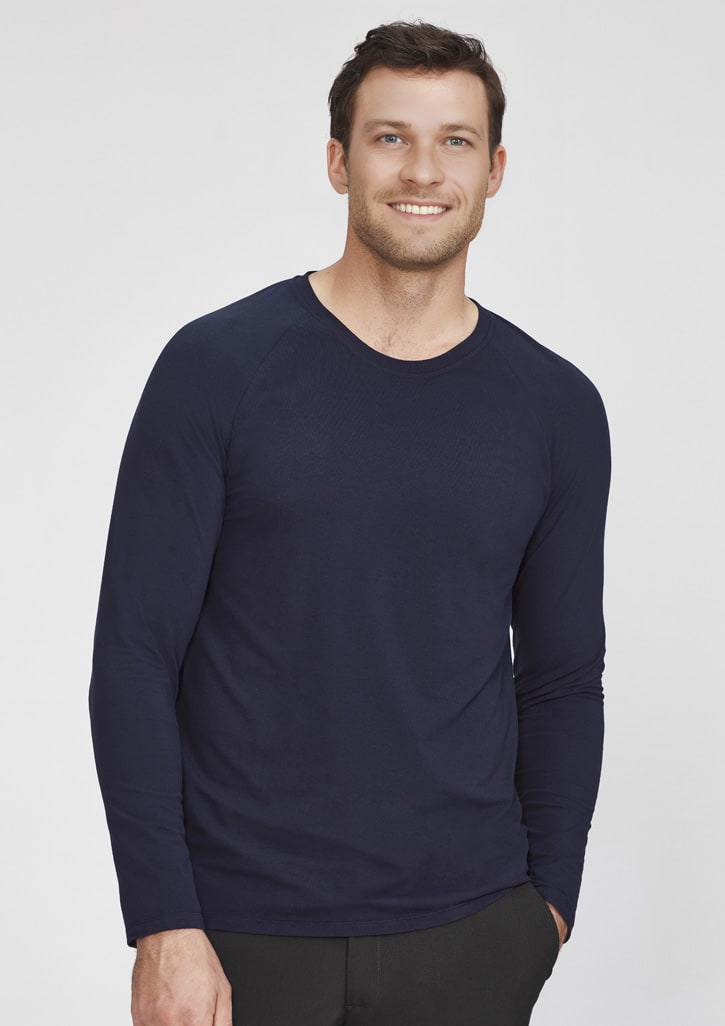 A men's performance long sleeve tee in navy blue, featuring a fitted design and a logo.